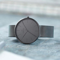 Obaku Hassel Smokey Quartz 6.7mm Slim Case Gun Round Dial Men's Watch- V219GXUUMU